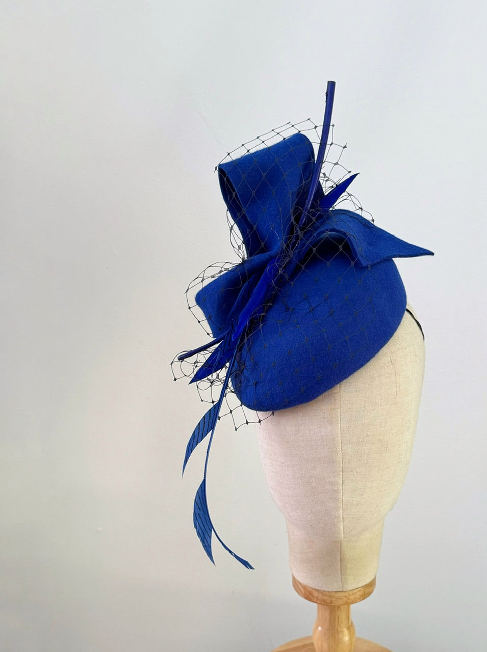 Blue  felt hat with feather feature