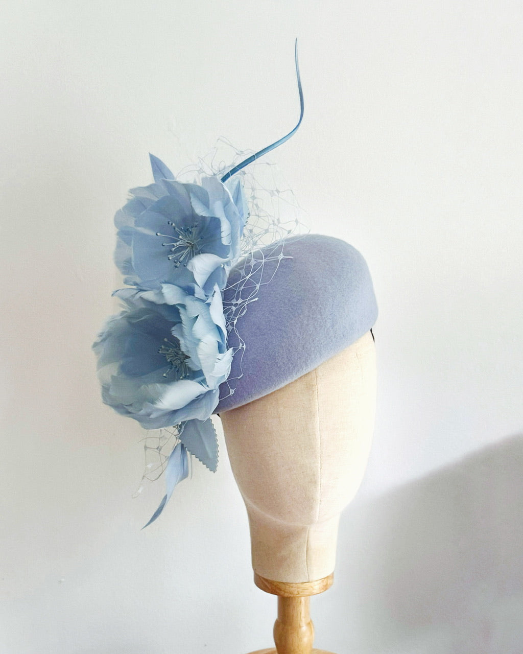 Light blue feather blooms felt hat