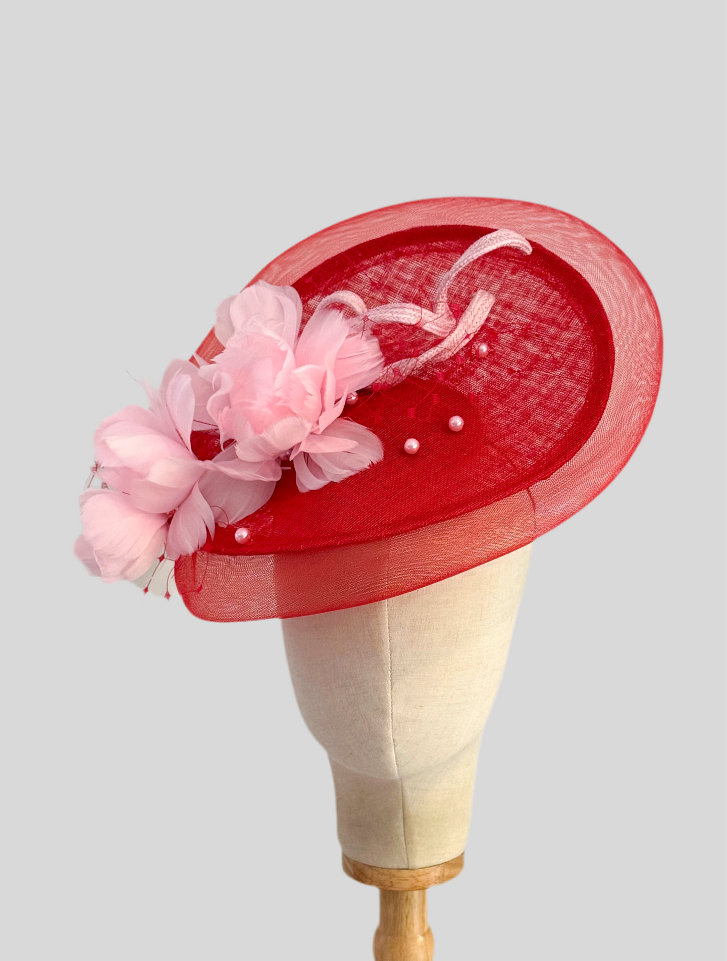 Red and pink feather floral disc